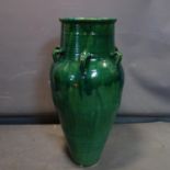 A large Persian green glazed Sharab wine vessel, H.89.5cm