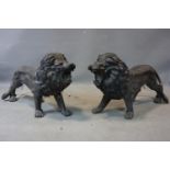 A large pair of cast spelter models of lions, H.49 W.83 D.24cm