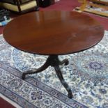 A 19th century mahogany tilt top breakfast table raised on splayed legs, H.75 D.107cm