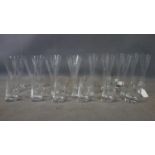 Two sets of 8 Pukeberg glass drinking vessels, together with 6 Colle crystal glasses