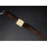 A Longines QWR gold plated wristwatch, Quartz movement, the gilt dial with baton markers, date