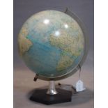 A terrestrial globe on stand, by Scan Globe AS, Denmark, 1983, H.43cm