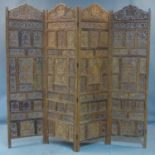 A pierced and carved teak 4 fold dressing screen, 188 x 204cm