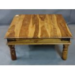 A contemporary sheesham wood coffee table, H.48 W.102 D.101cm