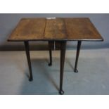 An early 19th century mahogany drop leaf table, H.71 W.90 D.77cm