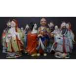 A collection of seven 20th century Chinese ceramic figures, with character marks to bases