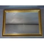 A contemporary gilt mirror, 101 x 70cm