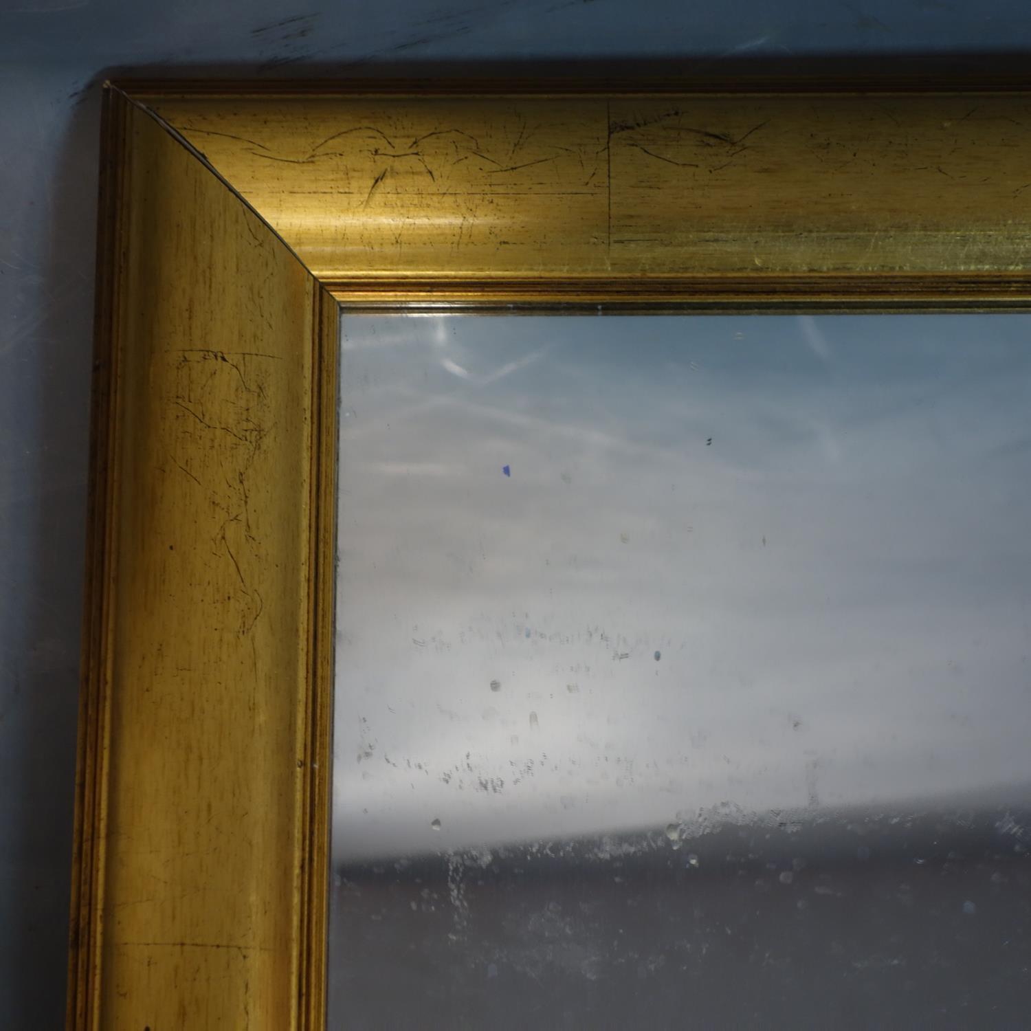 A rectangular giltwood wall mirror, 62.5 x 88cm - Image 2 of 2