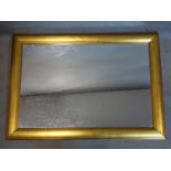 A rectangular giltwood wall mirror, 62.5 x 88cm