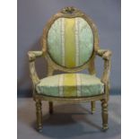 A Louis XV style gilt wood armchair