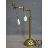 A Christopher Wray brass table lamp