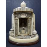 A 19th century Japanese carved ivory Buddhist shrine, bearing ivory plaques with artist signature