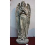 A large plaster figure of an angel holding a bird, H.120cm