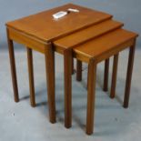 A McIntosh teak nest of three tables, bearing labels to verso, H.54 W.54 D.36cm (3)