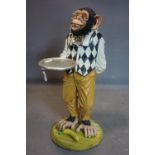 A fiberglass chimpanzee dumb waiter, H.100cm