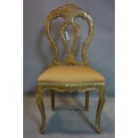 An early 20th century gilt wood chair