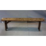 A 20th century oak bench, H.55 W.184 D.27cm