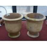 Two small fired clay planters, H.50cm Diameter 45cm