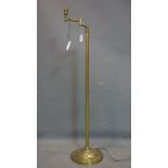 A Christopher Wray brass standard lamp