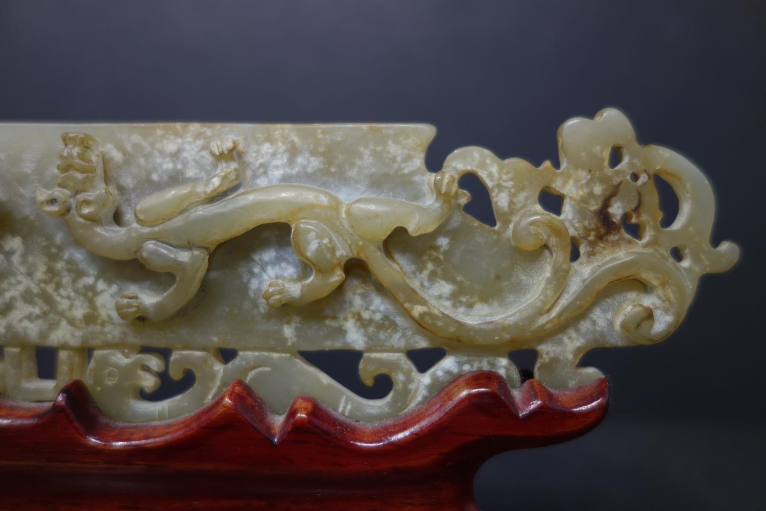 A 20th century Chinese jade tablet of 2 mythical beasts, 5 x 22cm, with fitted hardwood stand - Image 2 of 4