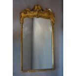 A Rococo style gilt wood and plaster pier mirror, 82 x 45cm