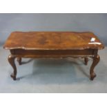 An inlaid mahogany low table, raised on cabriole legs, H.44 W.104 D.54cm