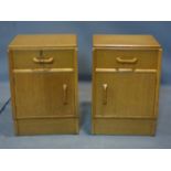 A pair of oak G-plan side cupboards, each with makers mark, H.52 W.36 D.33cm