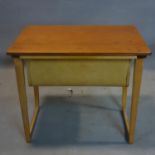 A mid century Danish teak sewing table, stamped O. P. Rykker & Co, having drawer with sectioned