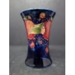 A vintage Moorcroft Pomegranate miniature cylindrical vase, stamped potter to H.M the Queen, H.9cm