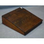 A 19th century oak writing slope, H.17 W.51 D.56cm