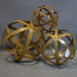 Three metal spheres