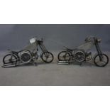 A pair of contemporary desk clocks in the form of vintage motorbikes, each having two dials with