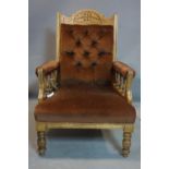 A late Victorian carved walnut framed armchair, H.97 W.67cm
