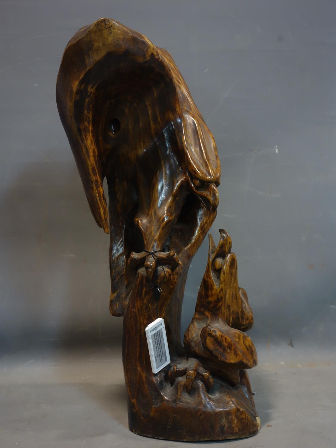 A large carved teak sculpture of two eagles fighting, H.74cm - Image 2 of 4