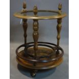 A 20th century globe stand converted to a table, with glass top, H.79cm Diameter 60cm