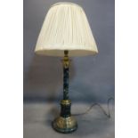 A green marble and brass table lamp, with silk shade, H.86cm
