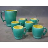 A set of 6 Bretby cups and the matching jug