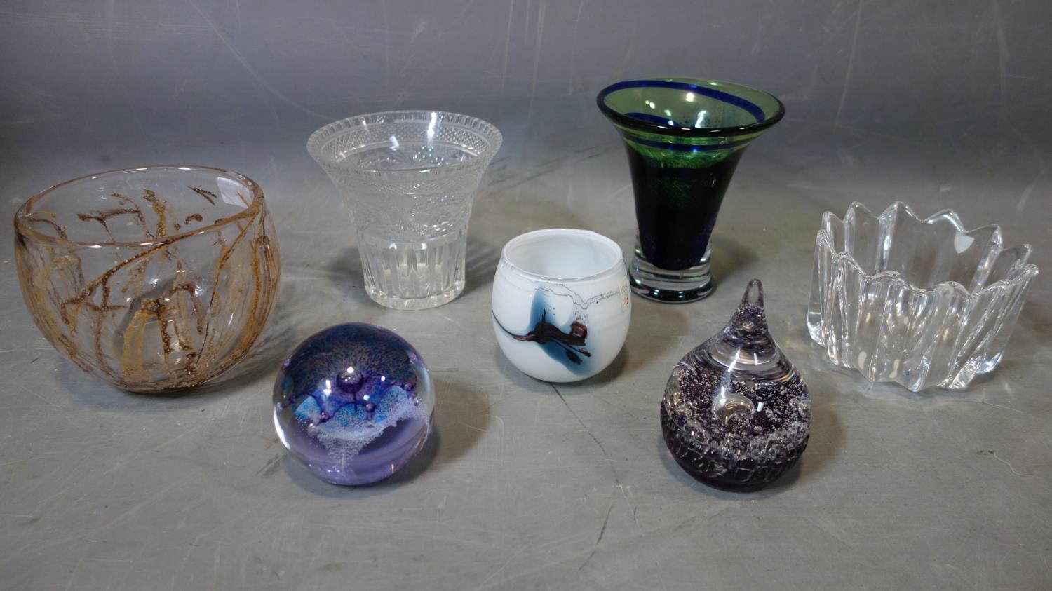 A collection of seven pieces of glassware, to include a Holmegaard glass cup, H.8cm; two glass