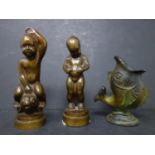 Two bronze cherubs, H.11.5cm, together with a cast metal fish vase, H.9cm