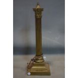 WITHDRAWN An early 20th century brass Corinthian column table lamp, on square base, H.50cm