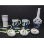A mixed lot of Danish ceramics, to include a Royal Copenhagen vase with elongated neck decorated