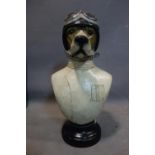 A moulded bust of a dog dressed as a racing driver, H.50cm