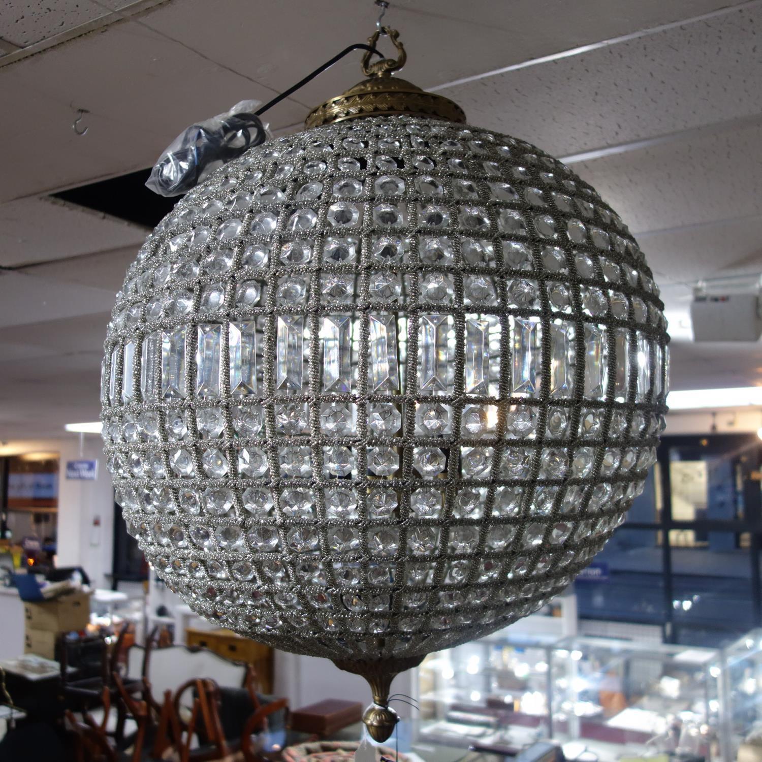 A large contemporary globular chandelier. H.83cm