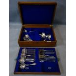 An Elkington canteen of silver plated cutlery, in oak case, to include dessert spoons, forks,
