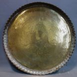 A mid to late 19th century finely chased Mamluk Persian brass plate, with calligraphy and