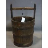 An antique iron bound oak well bucket, H.58cm