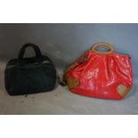 A Marni suede handbag together with a Marni red leather handbag