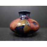 An early 20th century Moorcroft Pomegranate miniature squat vase, by William Moorcroft, circa 1900-