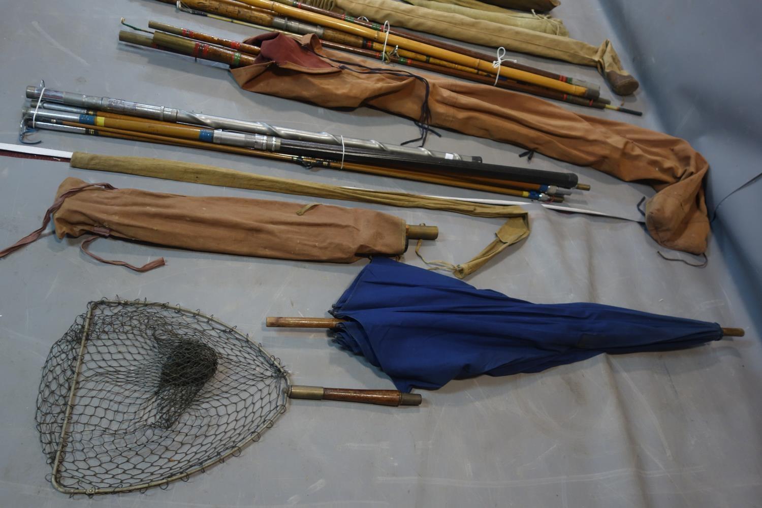 A collection of 10 vintage fishing rods to include 2 split cane and 8 bamboo, together with an - Image 3 of 3