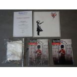A collection on Banksy items to include a limited edition Time Out Magazine, number 3265/5000,